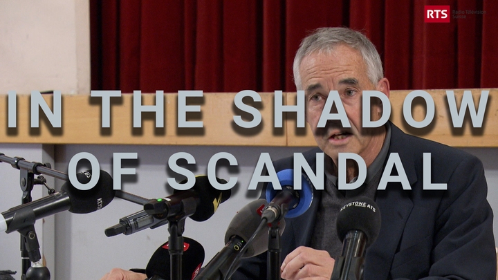 In The Shadow Of Scandal